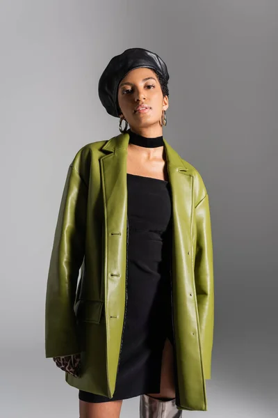Young African American Woman Leather Beret Coat Looking Camera Isolated — Stock Photo, Image