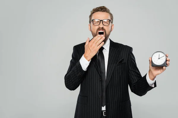 Tired Businessman Glasses Formal Wear Yawning While Holding Vintage Alarm — Stock Photo, Image