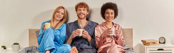 Open Relationship Concept Polygamy Redhead Man Happy Multicultural Women Pajamas — Stock Photo, Image
