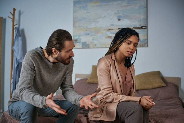 angry man arguing with african american woman, pregnancy, scream and gesture, abortion concept