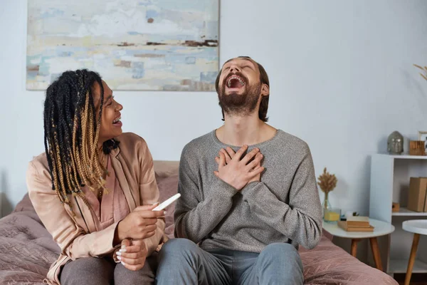 Happy African American Woman Holding Pregnancy Test Looking Husband Laughter — Stock Photo, Image