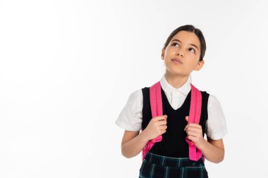 pensive schoolgirl standing with backpack and looking up while thinking about something, white clipart