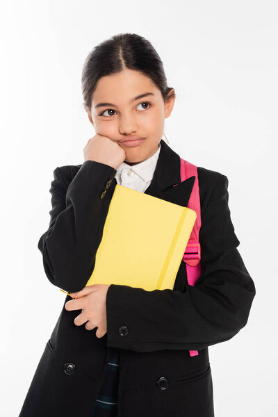 bored schoolgirl standing with notebooks isolated on white, back to school, displeased student