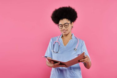 breast cancer awareness, african american doctor, happy oncologist reading medical record, folder clipart