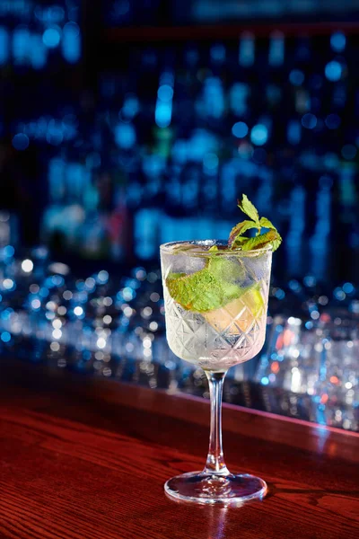 stock image elegant sophisticated bohemian rhapsody cocktail garnished with mint and lime, concept