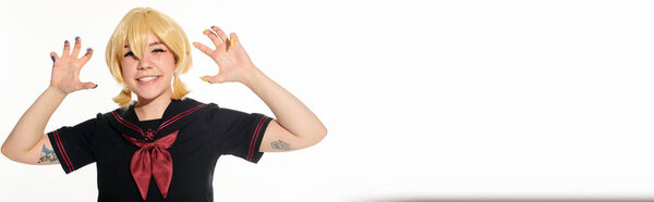 cute anime woman in school uniform and wig showing frightening gesture on white, horizontal banner