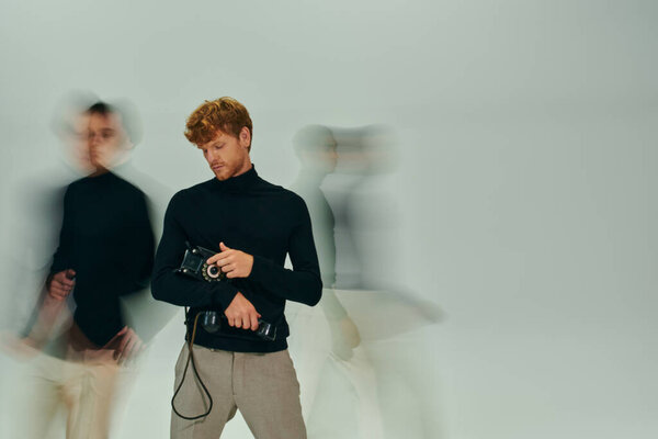 young multicultural trio posing with retro phone posing in motions, long exposure, men power