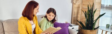 smiling woman reading book about sex education to teenage daughter  in living room, banner clipart