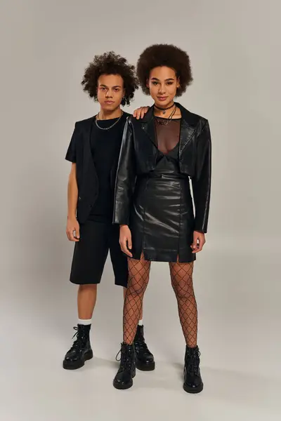 Attractive Smiling African American Siblings Fashionable Black Outfits Posing Actively — Stock Photo, Image