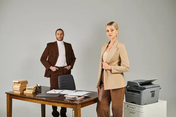 stock image pensive beautiful woman with collected blonde hair posing next to her bearded boyfriend, work affair