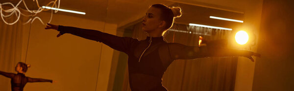 banner, graceful dancer in leotard, exuding strength and passion in her indoor sport of dance