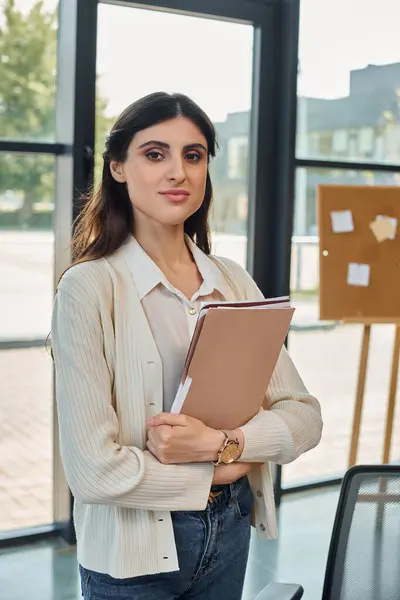 Businesswoman Standing Confidently Modern Office Holding Binder Next Table — Stock Photo, Image