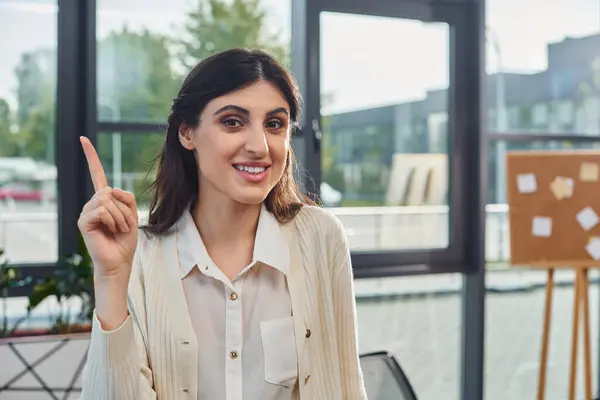 Modern Office Setting Featuring Businesswoman White Shirt Confidently Pointing Camera — Stock Photo, Image