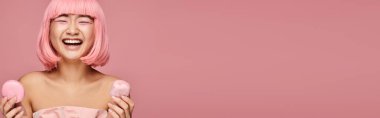 banner of cute asian woman with pink hair happy laughing and holding sweets on vibrant background clipart