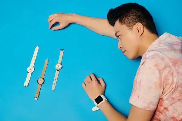 Stylish Young Man Trendy Attire Laying Ground Next Three Watches — Stock Photo, Image
