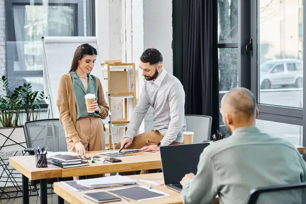 Group Professionals Discussing Project While Standing Table Office Setting — Foto Stock
