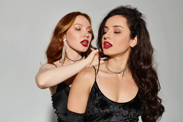 Elegant Lesbian Couple Matching Black Dresses Striking Red Lipstick Posing — Φωτογραφία Αρχείου