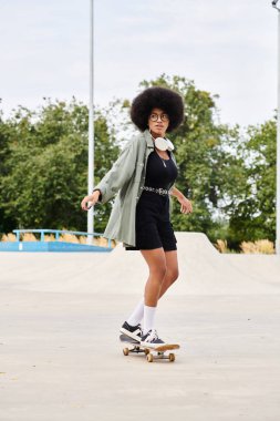 A young African American woman with curly hair confidently rides a skateboard down a bustling urban sidewalk. clipart