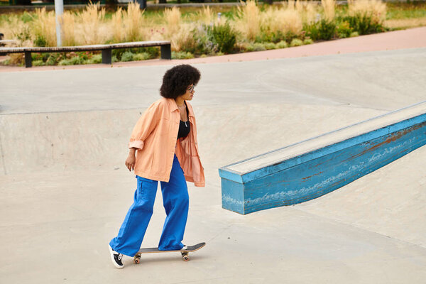 A young African American woman with curly hair skateboarding with style and confidence at a bustling skate park.
