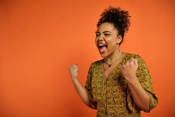 Beautiful African American Woman Open Mouth Posing Vibrant Orange Backdrop — Photo