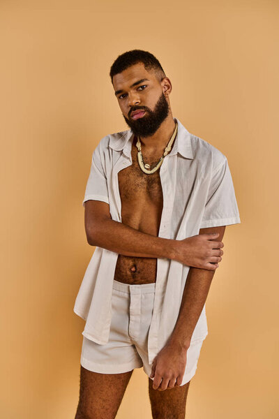 A man with a full beard is confidently striding along while wearing white shorts, exuding a sense of casual coolness and adventure.