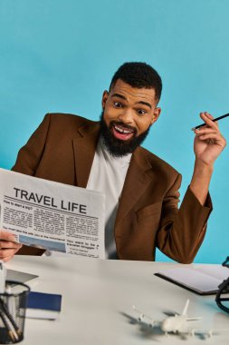 A man with a focused expression sitting at a table, holding a newspaper in his hands and reading the latest news and stories. clipart