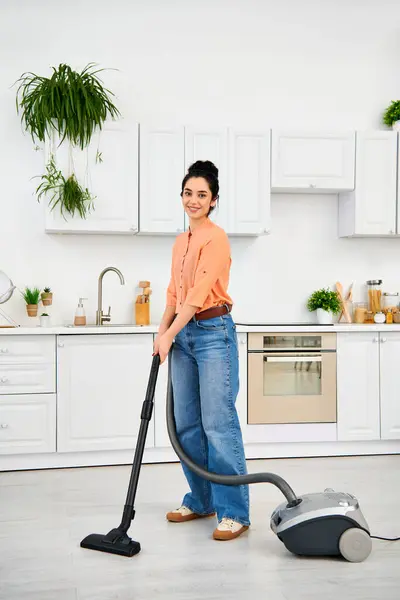 Stylish Woman Casual Attire Gracefully Vacuums Floor Her Home — Stock Photo, Image