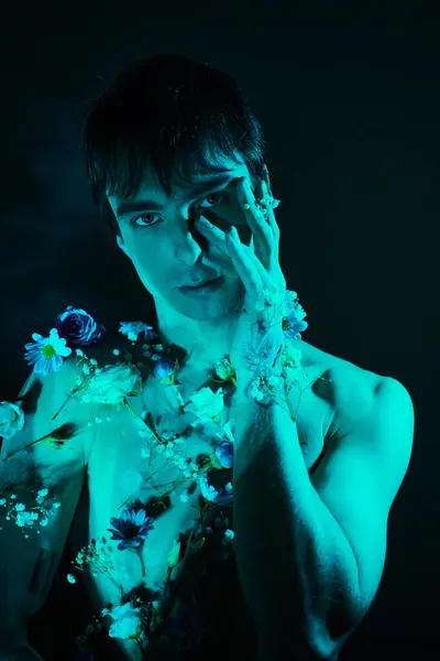 Young Man Gracefully Holds Delicate Flower His Hand Exuding Elegance — स्टॉक फ़ोटो, इमेज
