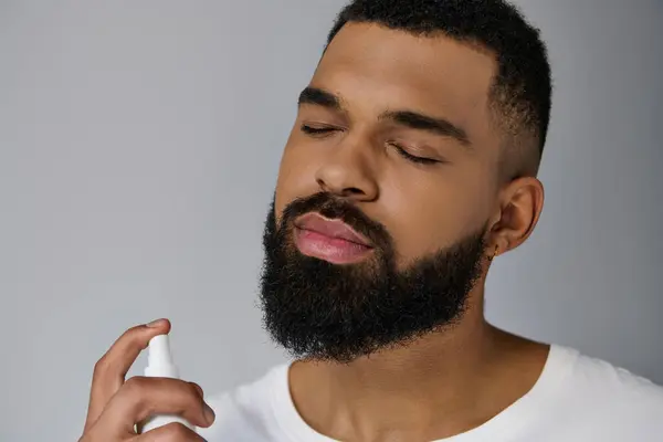 Handsome Young Man Beard Using Locion — Stock Photo, Image