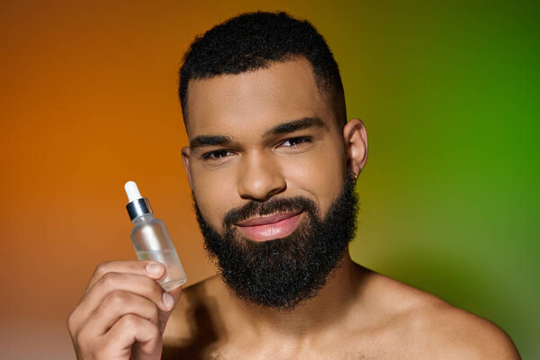 African american bearded man holds serum.