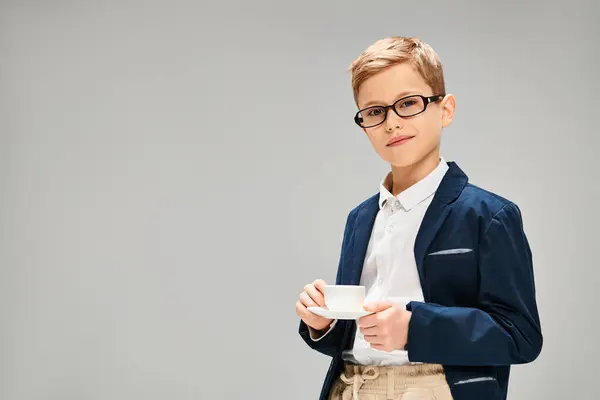 Chic Preadolescent Boy Glasses Holds Cup Coffee Gray Backdrop — Stock Photo, Image