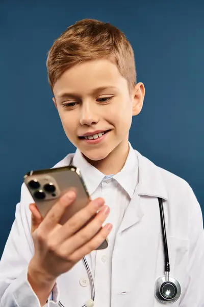 Boy White Doctors Coat Holds Cell Phone — Stock Photo, Image