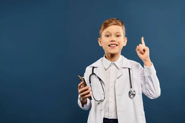 Young Boy Doctors Coat Pointing Enthusiastically — Stock Photo, Image