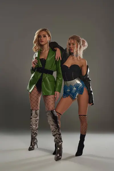Two Seductive Women Elaborate Costumes Strike Captivating Pose Together Exuding — Stock Photo, Image