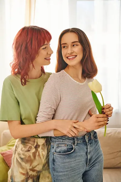 Tender Moment Lesbian Woman Holding Tulip Hugging Happy Girlfriend Symbol — стоковое фото