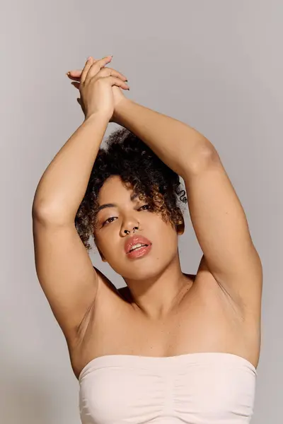 Stunning African American Woman Curly Hair Wearing White Top Holding —  Fotos de Stock
