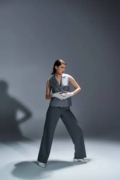 Stylish Young Woman Posing Elegant Suit Vest Studio Setting Grey — Stock Photo, Image