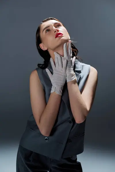 Stylish Young Woman Elegant Suit Vest Hands Her Face Showcasing — Stock Photo, Image