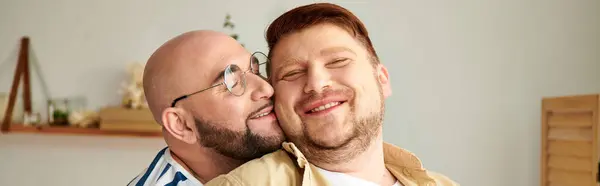 stock image Two men standing together while spending time at home.