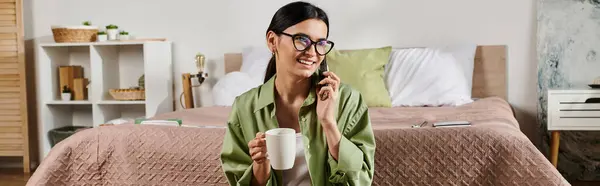 stock image A stylish woman enjoys her coffee in the comfort of her room.