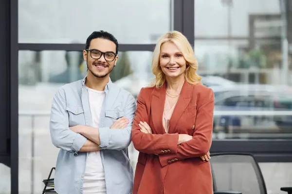 stock image Two business professionals discussing strategy in an office.