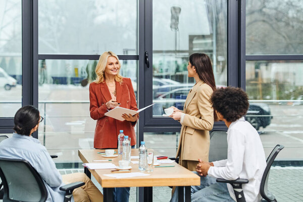 Job seekers in a conference room during a job interview.