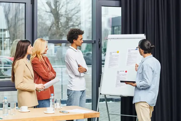 stock image Group of job seekers on interview, discussing ideas in front of whiteboard.