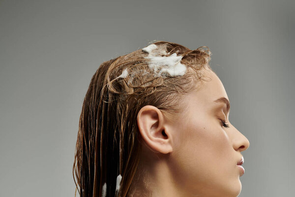 A young woman after caring for her wet hair.