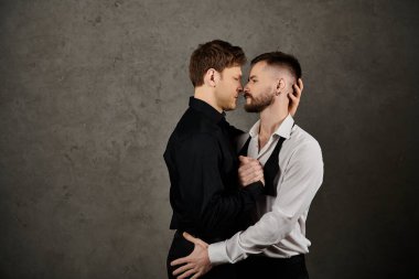 A gay couple in elegant suits stand close, sharing a tender moment. clipart