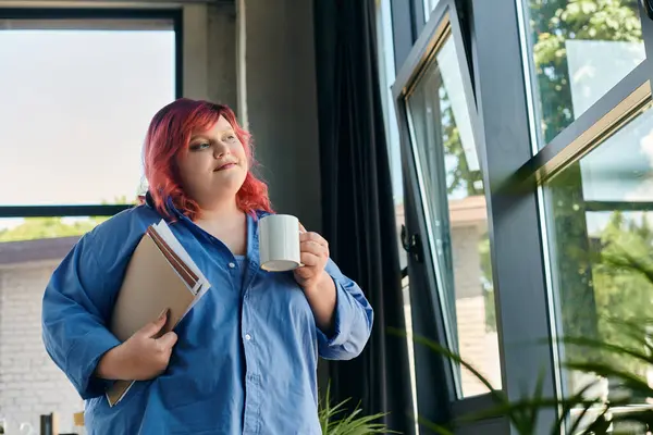 stock image A plus size woman enjoys her coffee by the window, reflecting on her day.