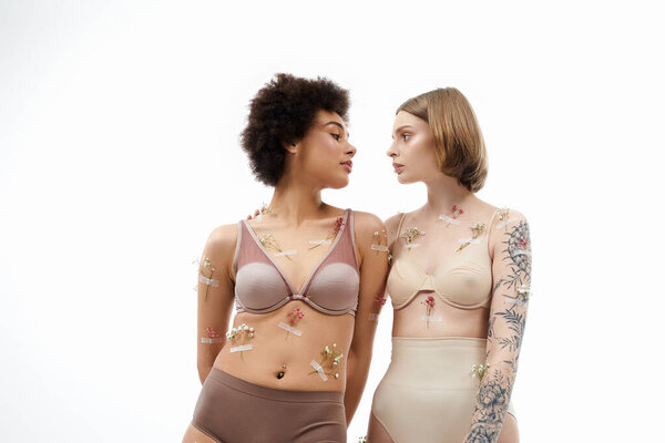 A loving embrace shared by two women, expressing joy and companionship.