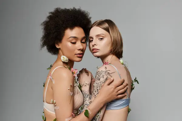 stock image A loving couple embraces, adorned with floral accents, celebrating their bond.