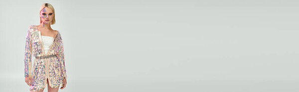 A young woman showcases her stylish holographic attire, radiating confidence.