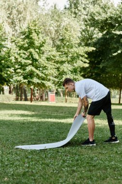 man workout outdoors, showcasing strength and inclusivity in a beautiful park. clipart